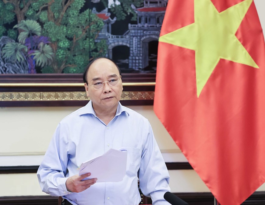 State President Nguyen Xuan Phuc speaking at the event (Photo: VNA)
