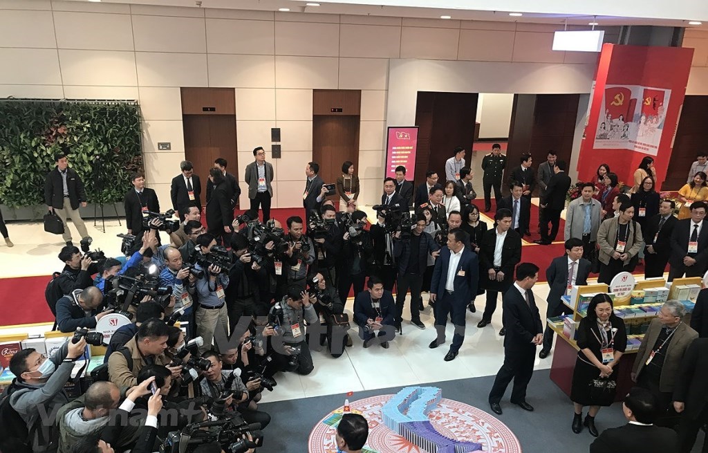 Over 500 reporters and technicians from more than 200 domestic and foreign media outlets will cover the 13th National Party Congress at the scene. (Photo: VNA)