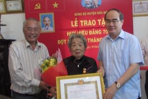 Presenting Party badges to 2,336 Party members