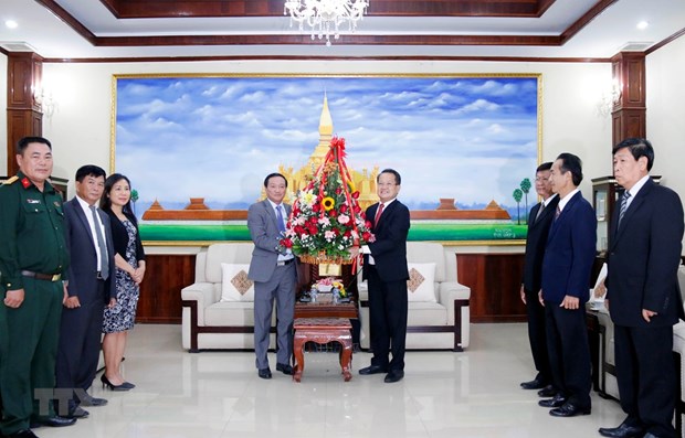 Vietnamese Ambassador to Laos Nguyen Ba Hung on March 19 headed a delegation to the headquarters of the Commission for External Relations of the Lao People’s Revolutionary Party (LPRP) Central Committee, on the occasion of the 66th founding anniversary of the Lao Party (March 22). (Photo: VNA)