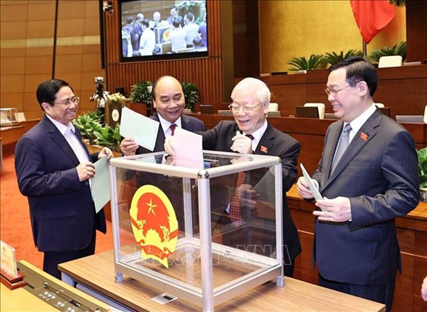 From left: Prime Minister Pham Minh Chinh, President Nguyen Xuan Phuc, Party General Secretary Nguyen Phu Trong and National Assembly Chairman Vuong Dinh Hue cast ballots to elect a number of members of the NA Standing Committee (Photo: VNA)