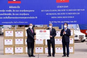Vietnam first country to give financial, personnel, and material support to Laos for COVID-19 prevention